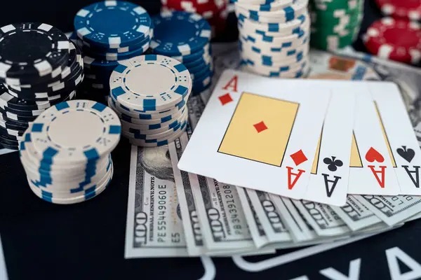 Live Casino Hold'em table setup Live Casino Hold'em table with dealer and community cards